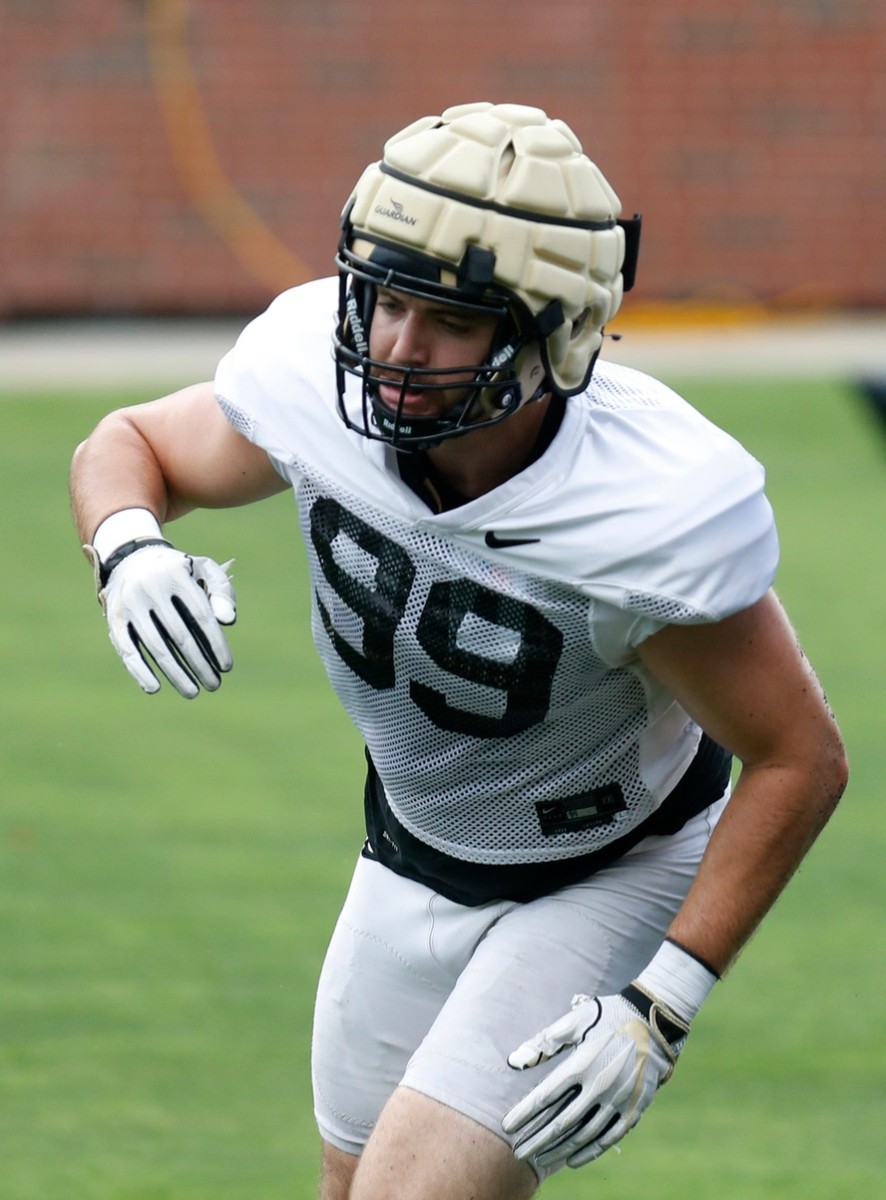 Purdue Boilermakers defensive end Jack Sullivan (99) runs a drill during practice, Friday, Aug. 5, 2022, at Ross-Ade Stadium in West Lafayette, Ind.